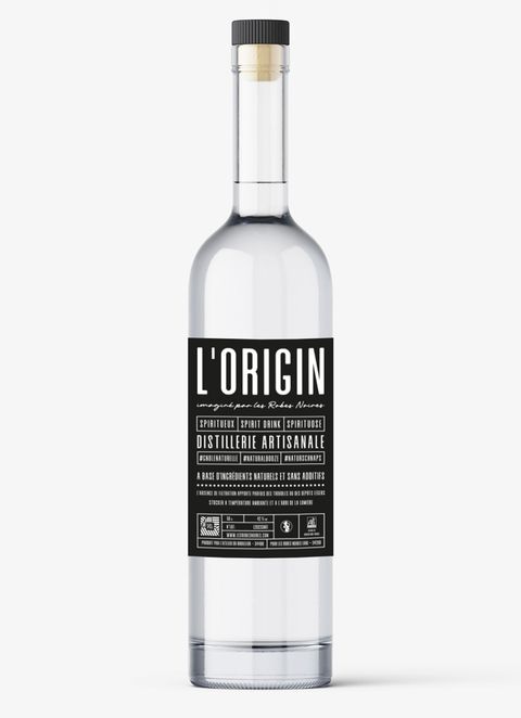 Bouteille de L’Origin, boisson spiritueuse biologique du domaine Les Robes Noires.